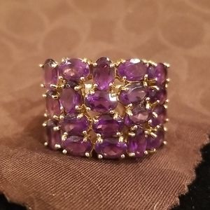 Vintage 19 stone amethyst ring with gold clutch